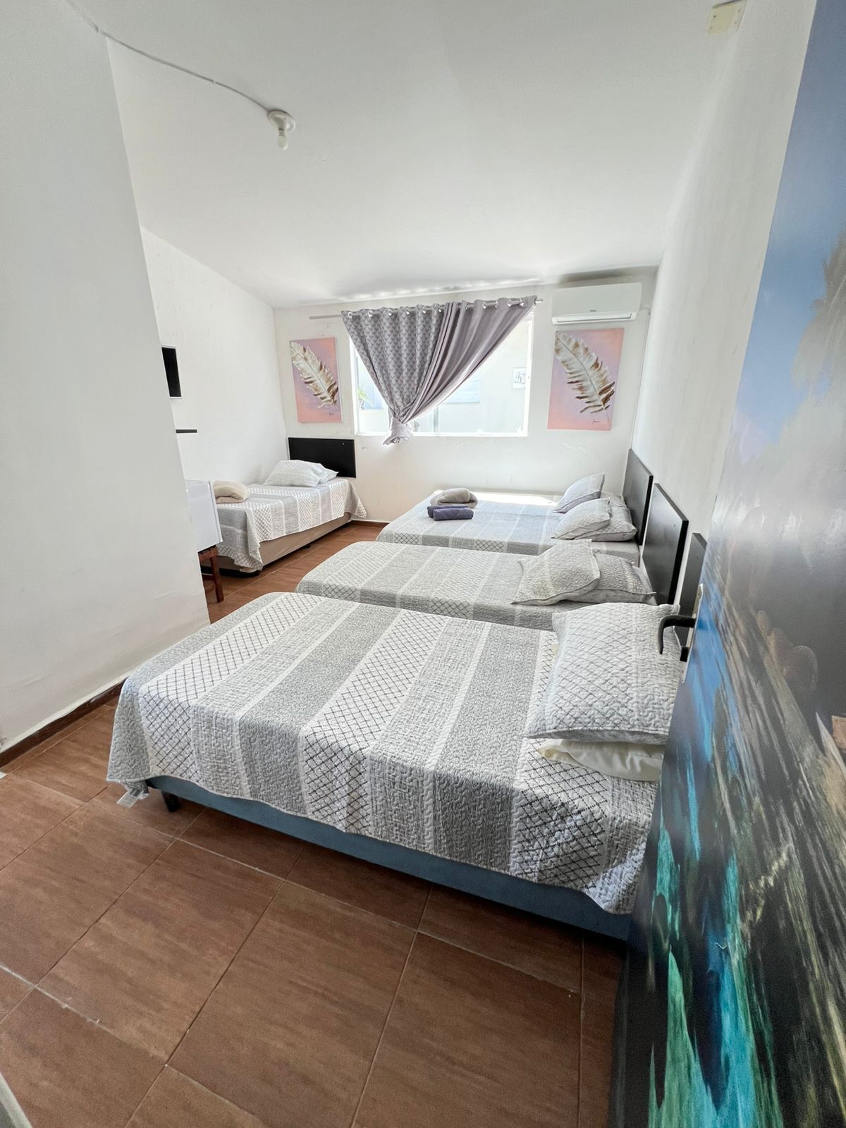 Habitación familiar | Escritorio, wifi gratis, ropa de cama