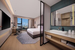 Premium bedding, down comforters, desk, laptop workspace