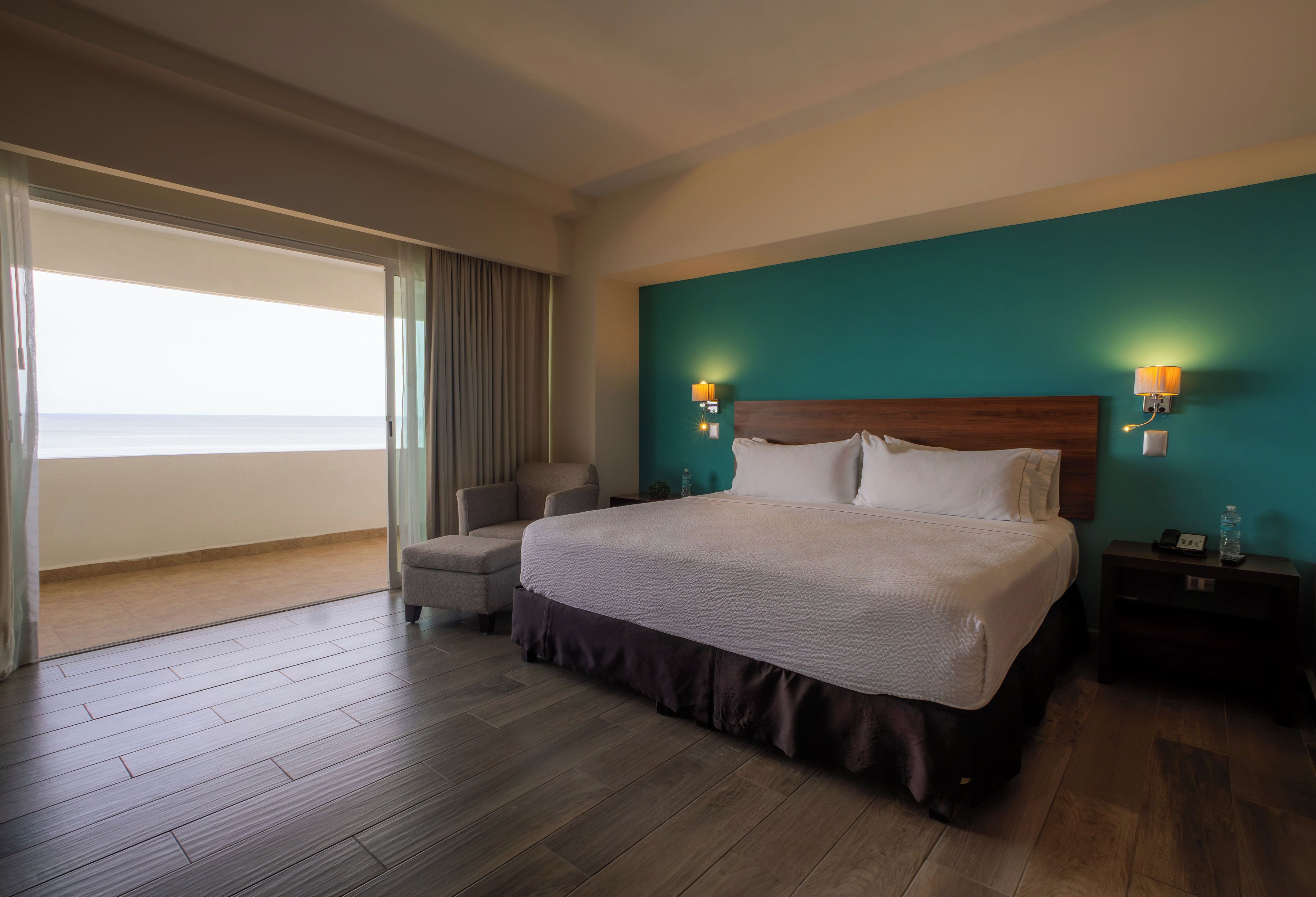 Suíte estúdio luxo, vista para o mar | Roupas de cama premium, cofres nos quartos, cortinas blackout