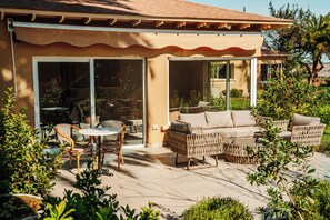 Deluxe Double Room, Patio, Garden View | In-room safe, desk, free WiFi, wheelchair access