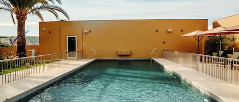 Outdoor pool, open 11:00 AM to 7:00 PM, pool umbrellas, sun loungers