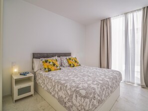 2 dormitorios, tabla de planchar con plancha, Internet y ropa de cama