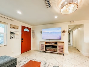 Smart TV, fireplace, video games, foosball