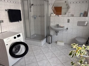 Hair dryer, towels, soap, toilet paper