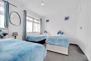 4 habitaciones, tabla de planchar con plancha y wifi gratis 