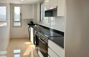 Microwave, stovetop, dishwasher, coffee/tea maker