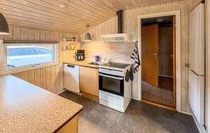 Fridge, stovetop, dishwasher, coffee/tea maker