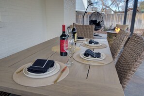 Outdoor dining - Luxe & Large 4BR/3BA • Sleeps 8 • Theater, GameRoom, FirePit, Fenced Yard (Centennial)