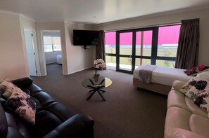 Family Apartment | Living area | 43-inch Smart TV with satellite channels