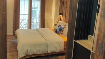 1 habitación, tabla de planchar con plancha, wifi y ropa de cama