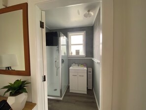 Shower, towels, soap, toilet paper