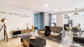 Apartment, 2 Queen Beds | Living area | 43-cm Smart TV with digital channels