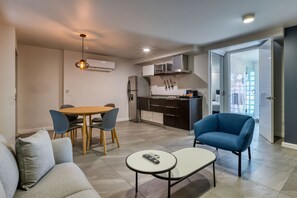 Apartment, 1 Queen Bed | Private kitchenette | Full-size fridge, stovetop, coffee/tea maker, cookware/dishes/utensils - Comfort Suites Tijuana (Tijuana)
