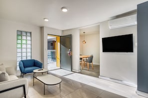 Apartment, 1 Queen Bed (Larger Room) | Living area | 43-cm Smart TV with digital channels