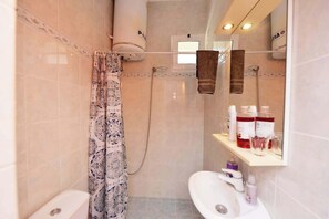 Shower, hair dryer, shampoo