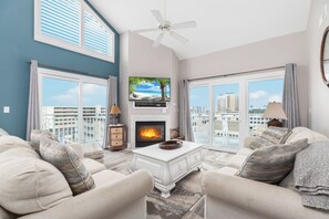 TV, fireplace, books, stereo
