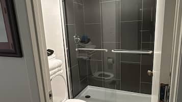 Standard Room, 2 Queen Beds, Non Smoking | Bathroom | Combined shower/tub, free toiletries, hair dryer, towels