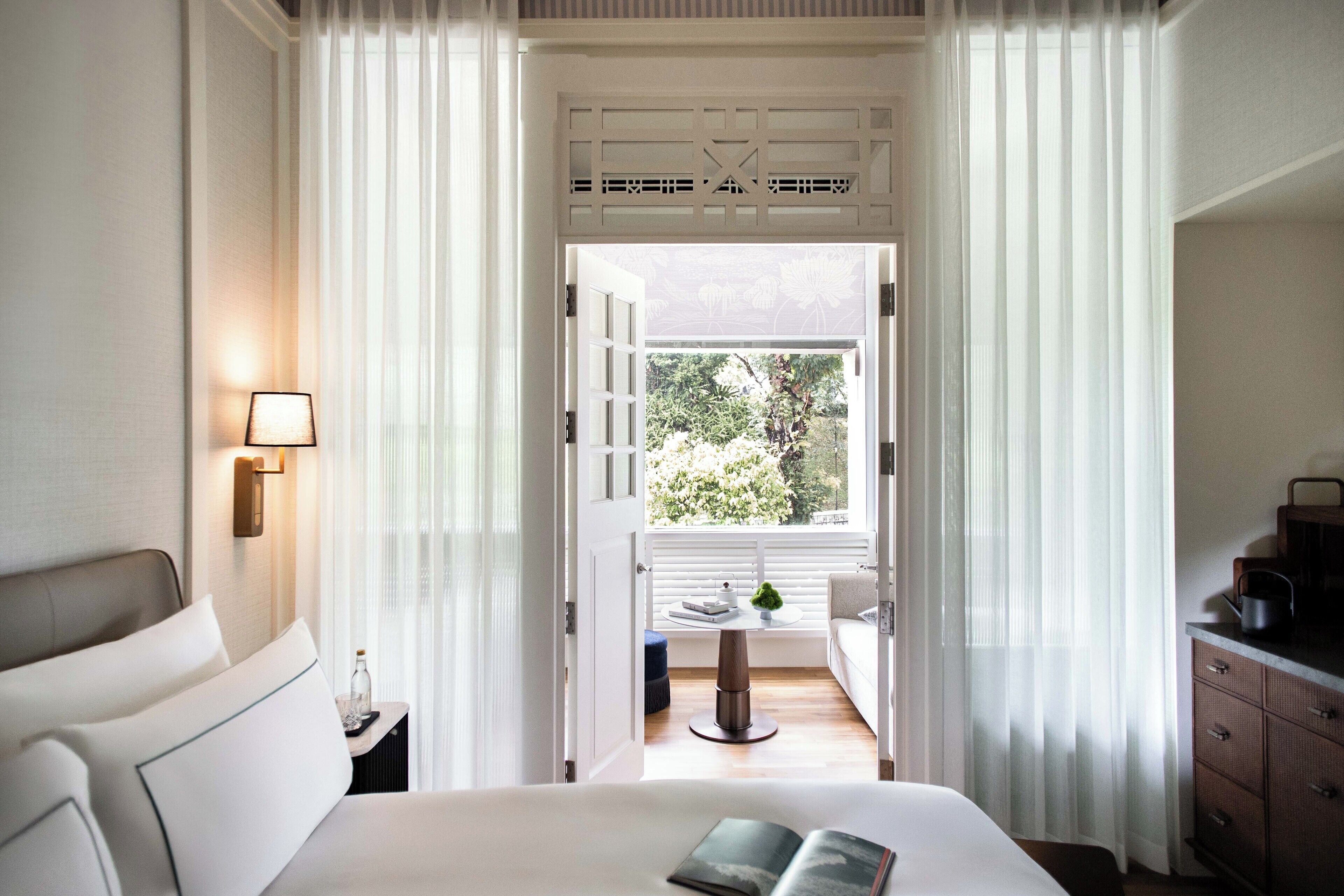 Junior Suite, Park View | Minibar, in-room safe, desk, laptop workspace