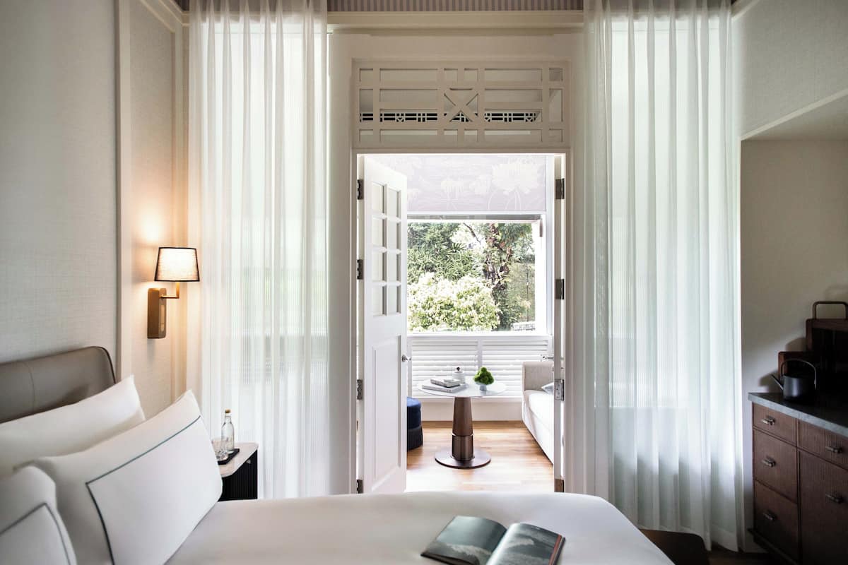 Junior Suite, Balcony, Park View | In-room safe, desk, laptop workspace, blackout drapes