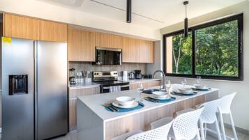 Coffee/tea maker, fridge, microwave, oven