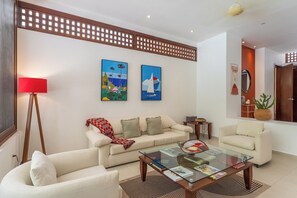 Deluxe Villa, 4 Bedrooms, Private Pool, Pool View | Living area | 60-inch LED TV with digital channels, Netflix, streaming services - Villa Tres Delfines Private Pool And Family Fun Puerto Aventuras (Puerto Aventuras)