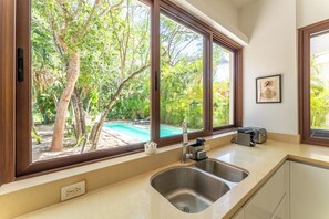 Deluxe Villa, 4 Bedrooms, Private Pool, Pool View | Private kitchen | Full-sized fridge, microwave, oven, stovetop - Villa Tres Delfines Private Pool And Family Fun Puerto Aventuras (Puerto Aventuras)