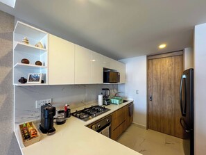 Private kitchen - Modern Apartment with Top Amenities · Prime Santa Fe Location · 2BR/2BA (Ciudad de México)