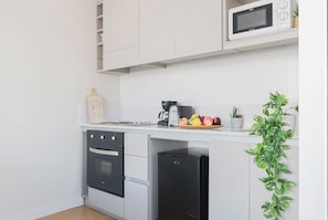 Departamento Confort, vista a la ciudad | Cocina privada