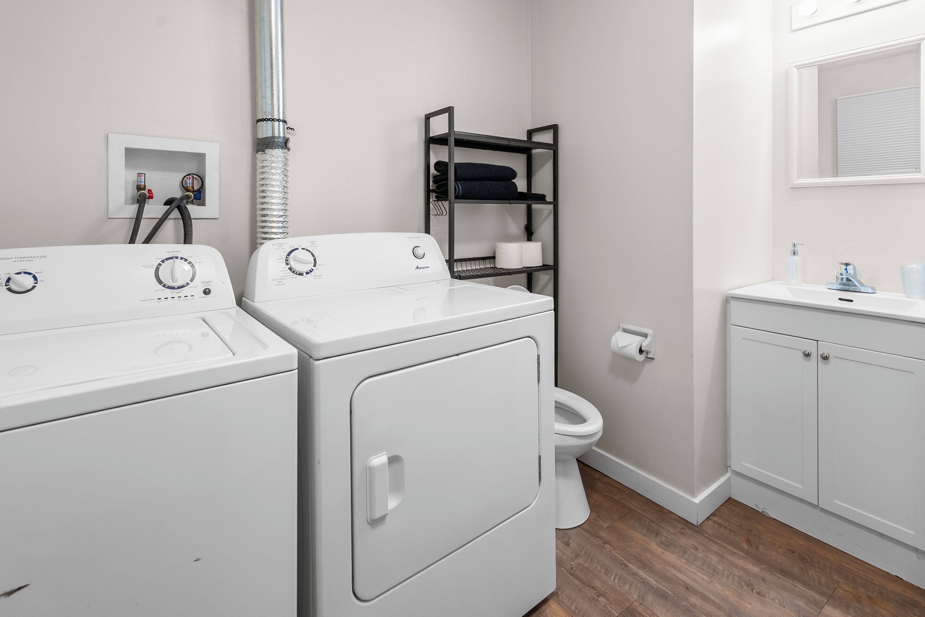 Hair dryer, towels, soap, toilet paper