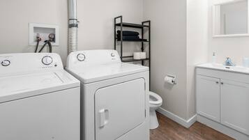 Hair dryer, towels, soap, toilet paper