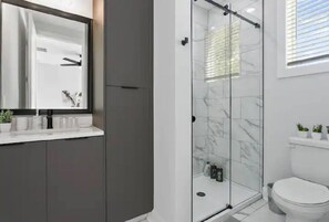 Hair dryer, towels, soap, toilet paper