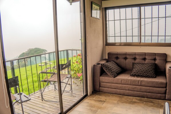 Deluxe Double or Twin Room, City View | Living area - Cabañas La Montañuela (Llano Grande)