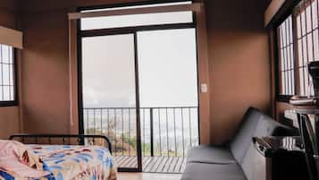 Quarto casal ou duplo luxo, vista para a cidade | Wi-Fi de cortesia
