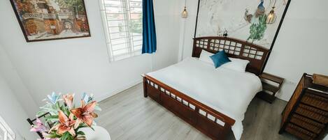 4 habitaciones, tabla de planchar con plancha y acceso a internet