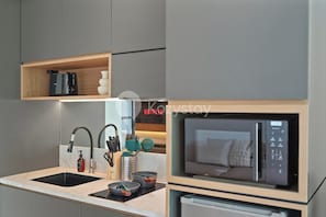 Departamento, 1 habitación, vista al resort | Cocina privada | Refrigerador con congelador, microondas, parrilla de estufa y tostadora