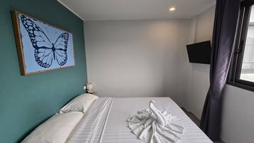 Apartment, Balcony | In-room safe, blackout drapes, iron/ironing board, free WiFi