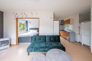 Appartement | Coin séjour | Télévision à écran plat de 40 pouces avec chaînes numériques