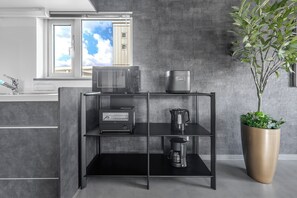 Fridge, microwave, stovetop, cookware/dishes/utensils