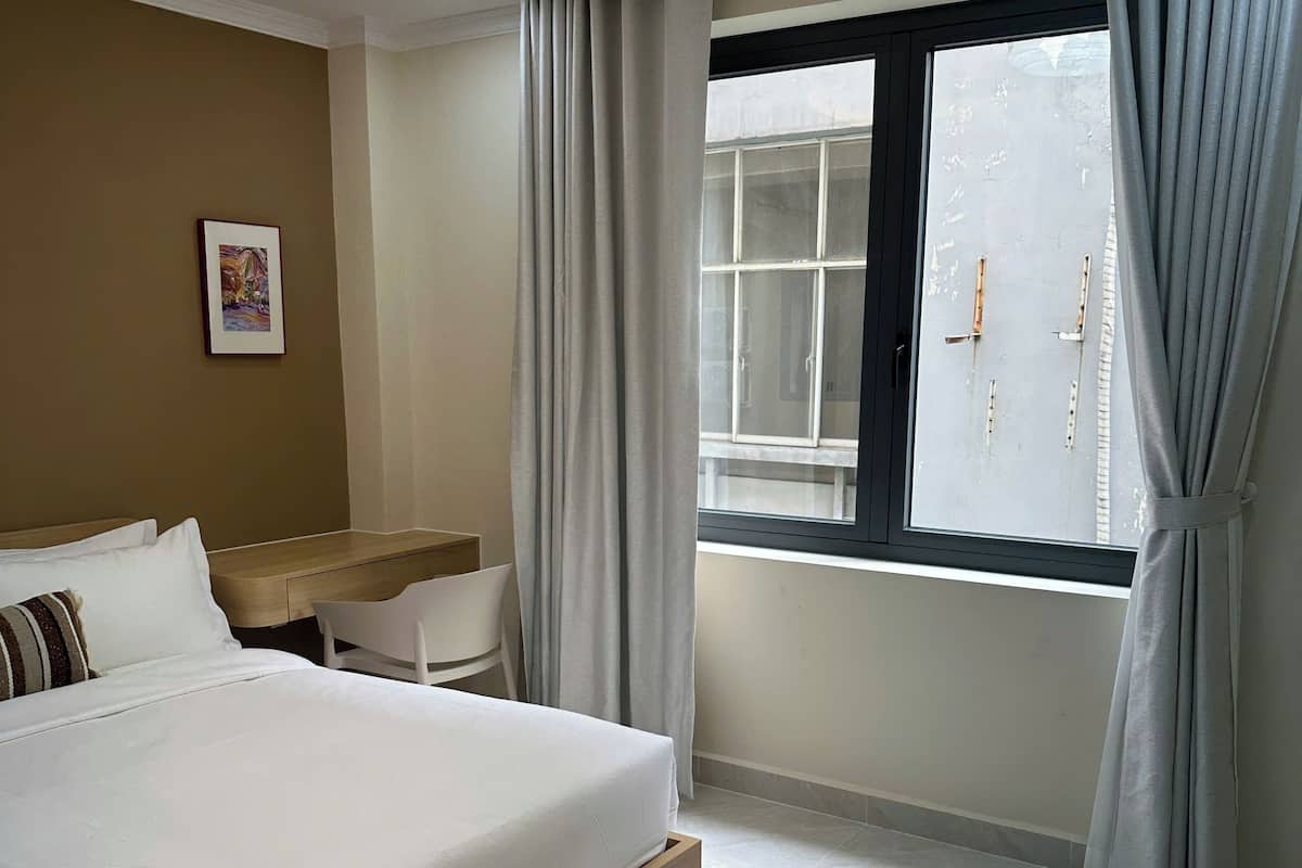 Habitación doble Deluxe | Espacio para trabajar con laptop, wifi gratis y ropa de cama