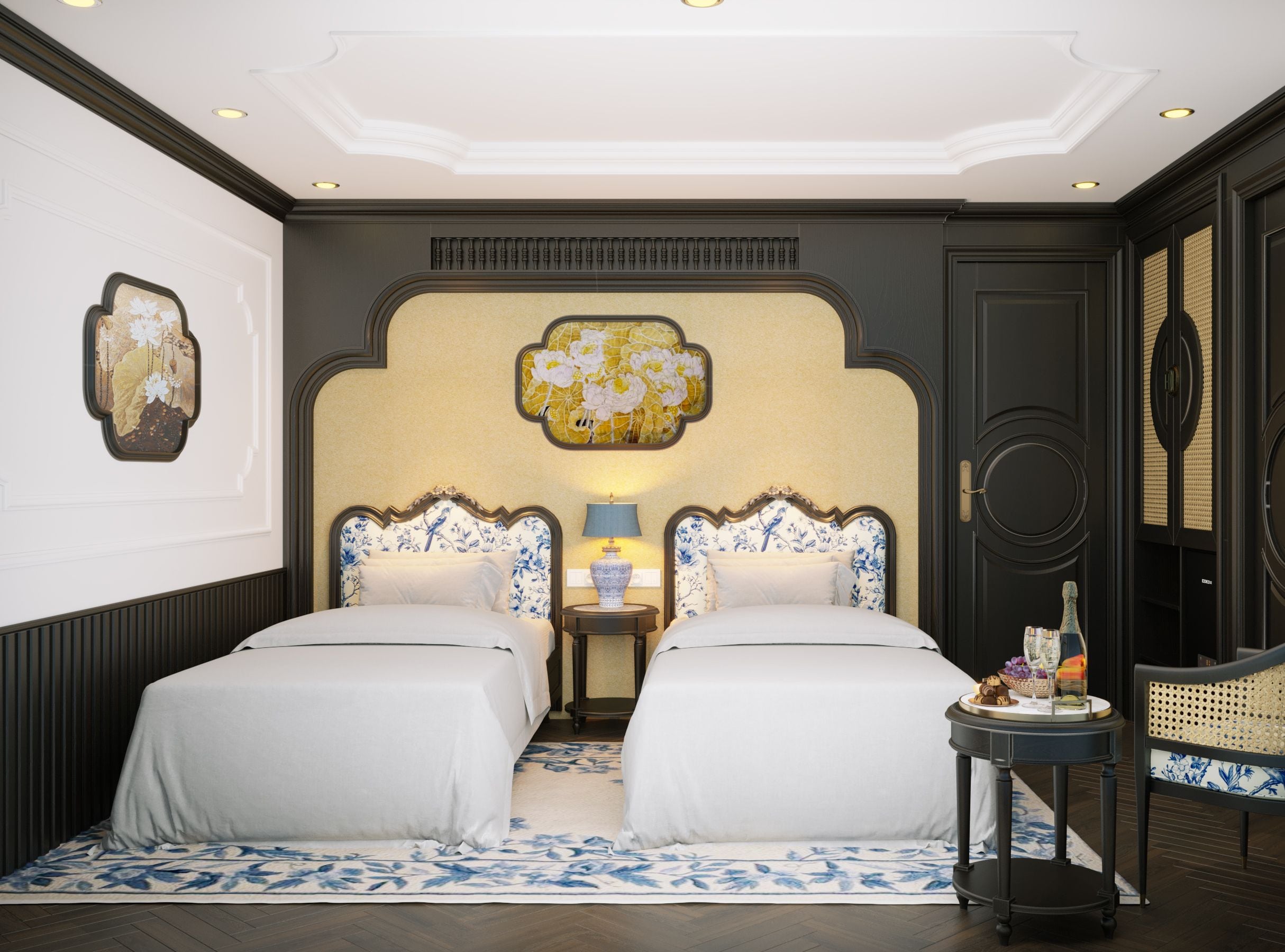 A hotel room with two beds, a small table with a lamp, a decorative wall piece, and a wicker chair.