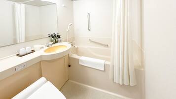 Combined shower/bathtub, hair dryer, towels, shampoo