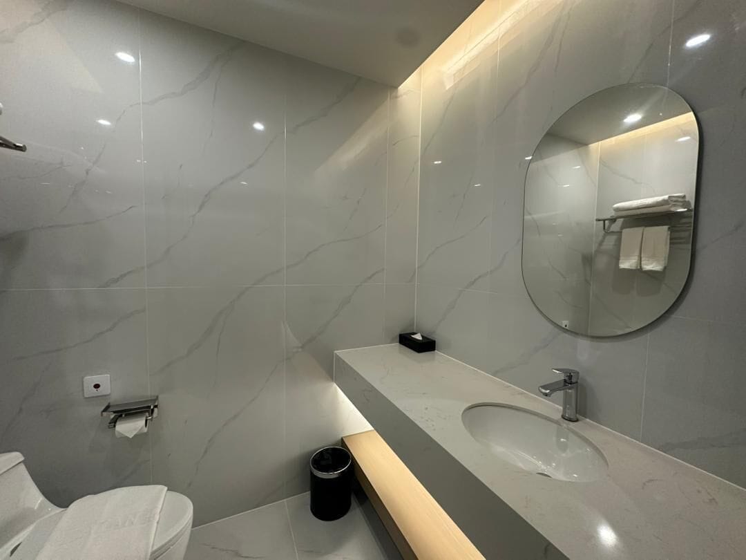 Habitación Deluxe | Baño | Pantuflas 