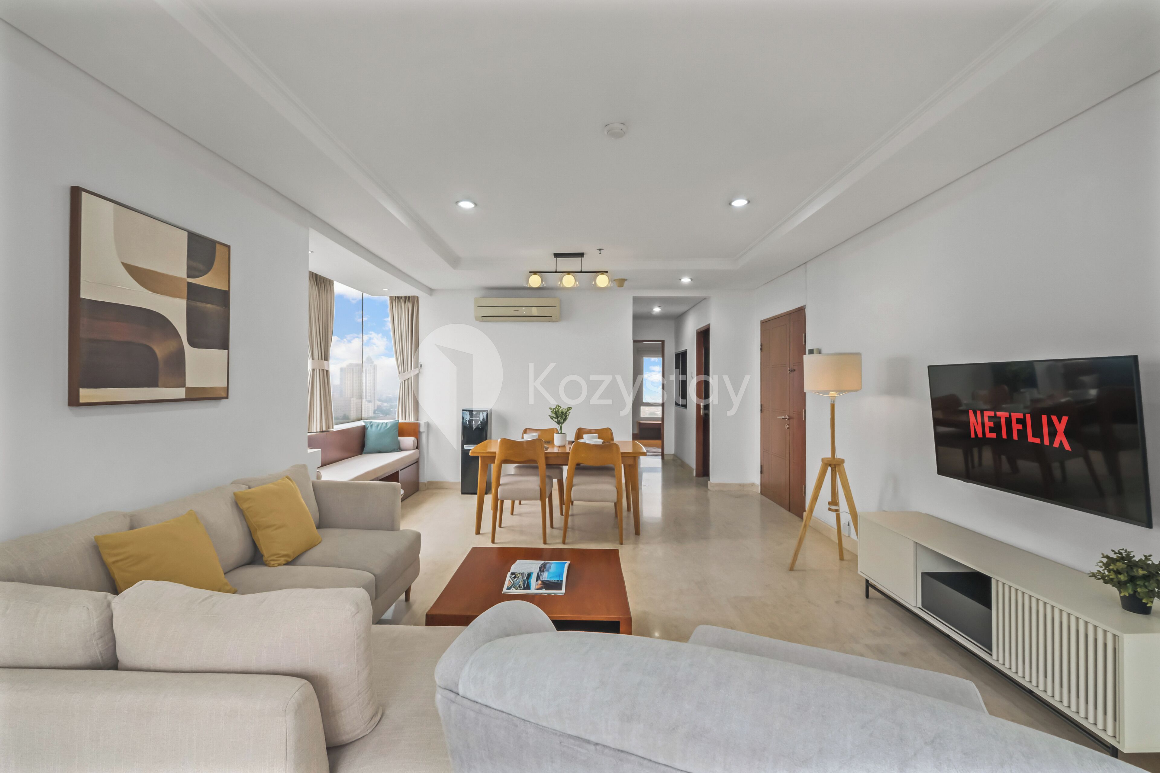 Apartment, 3 Bedrooms, City View | Living room | 50-inch Smart TV with cable channels, Netflix, streaming services
