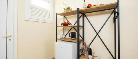 Dreibettzimmer, Gartenblick | Minibar