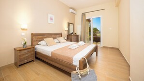 A hotel room with a wooden bed, a nightstand, a dresser, a mirror, and a sliding glass door to the balcony.