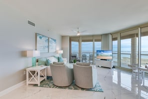 Signature Condo, 3 Bedrooms, Balcony, Beach View | Living room | 65-inch Smart TV with cable channels