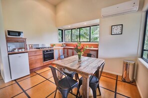 Chalet, 1 Bedroom, Smoking, Balcony | Dining room - Ecoasis Mami Wata Rainforest Haven (Smiths Creek)