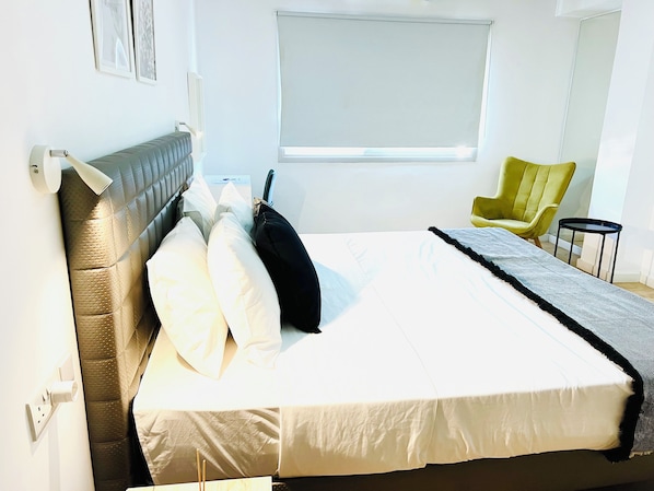 Estudio Confort, lanai, vista a la ciudad | Tabla de planchar con plancha y wifi gratis