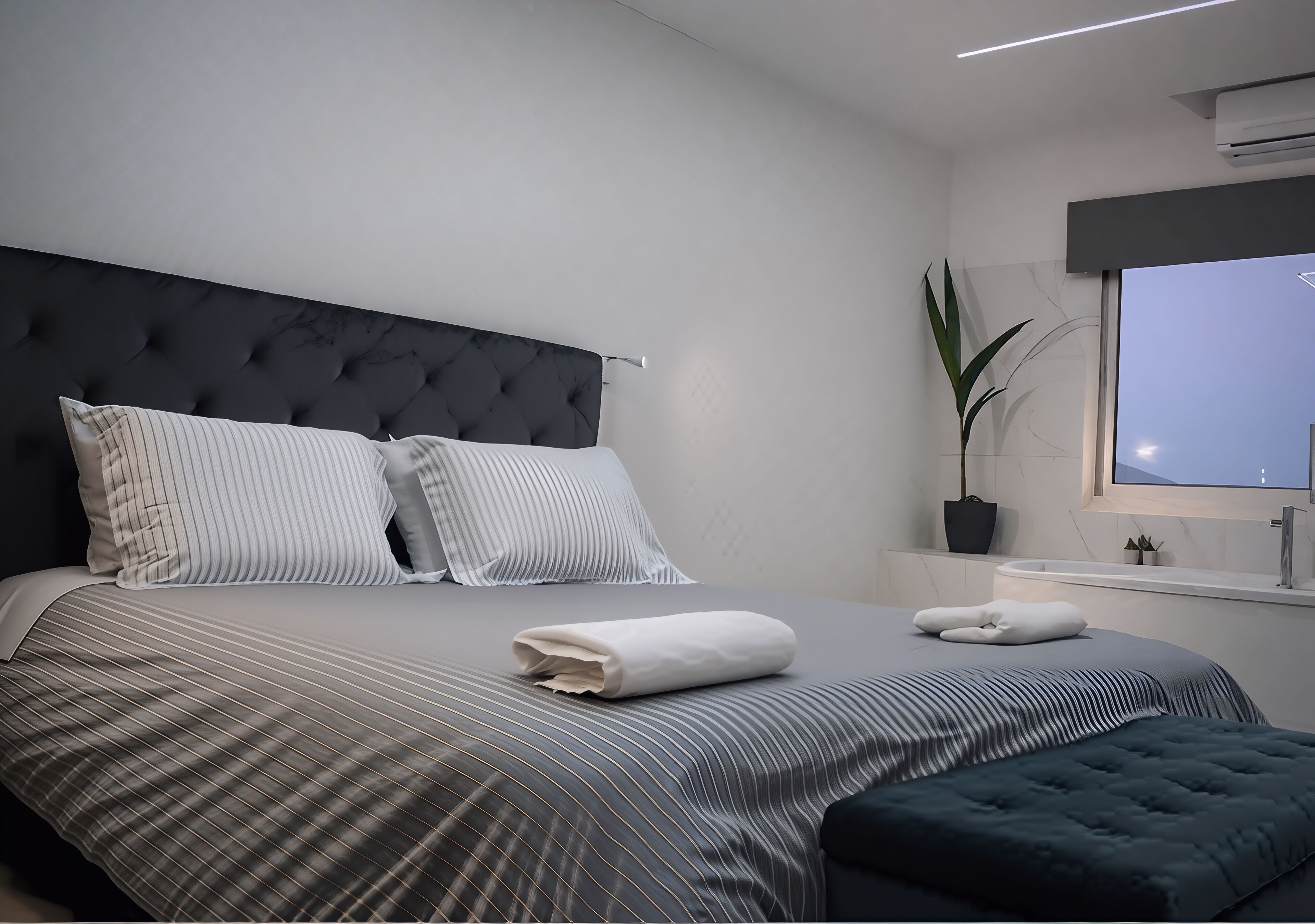 Habitación Deluxe, 1 habitación, vista a la ciudad | Tabla de planchar con plancha y wifi gratis 