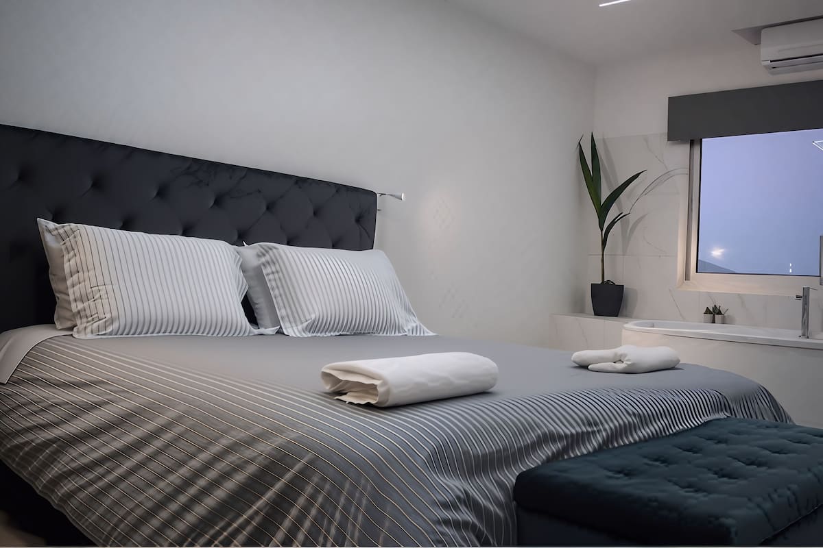 Deluxe Apartment, City View | Iron/ironing board, free WiFi